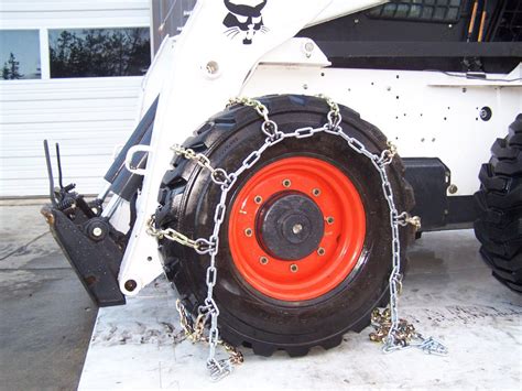 putting chains on a skid steer|12x16.5 skid steer tire chains.